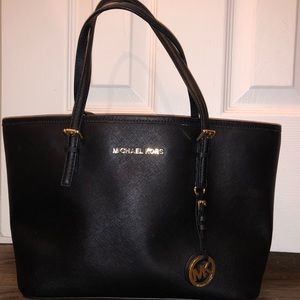 MK black medium leather tote bag